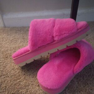 Pink fuzzy slippers